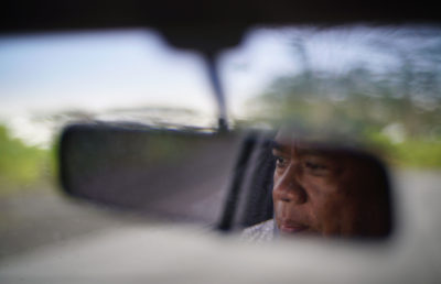 Michael Makekau drives to the scale house at the old Hilo landfill where he was sickened by mold from an air conditioner.